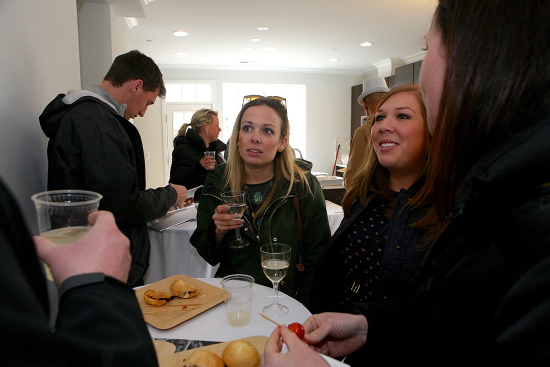 Emily Baird and Remy Kelish enjoy light bites and champagne. 