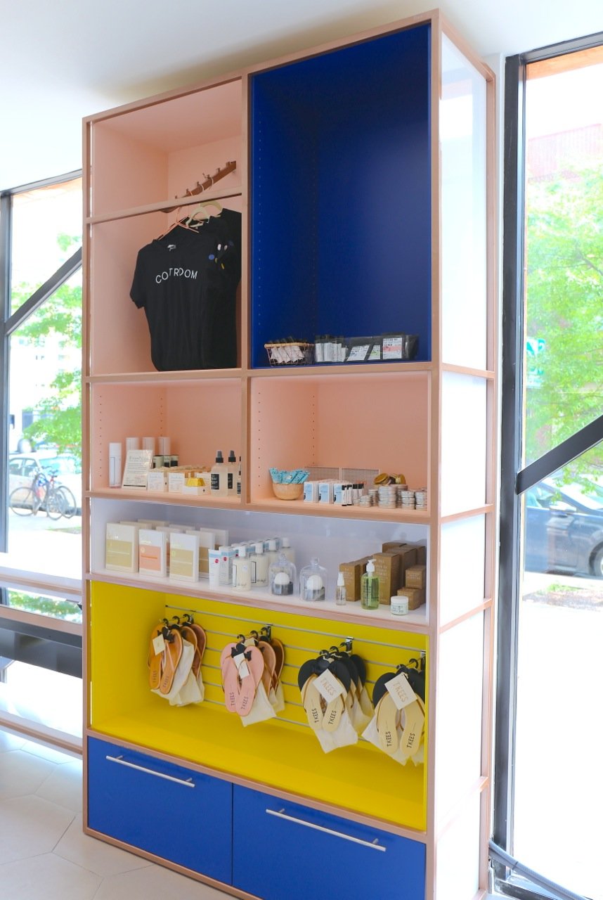 COATROOM’s curated retail wall features beauty products from brands like Tkees, Karuna, Etta + Billie, Youth to the People and Little Barn Apothecary. All photos courtesy of COATROOM.