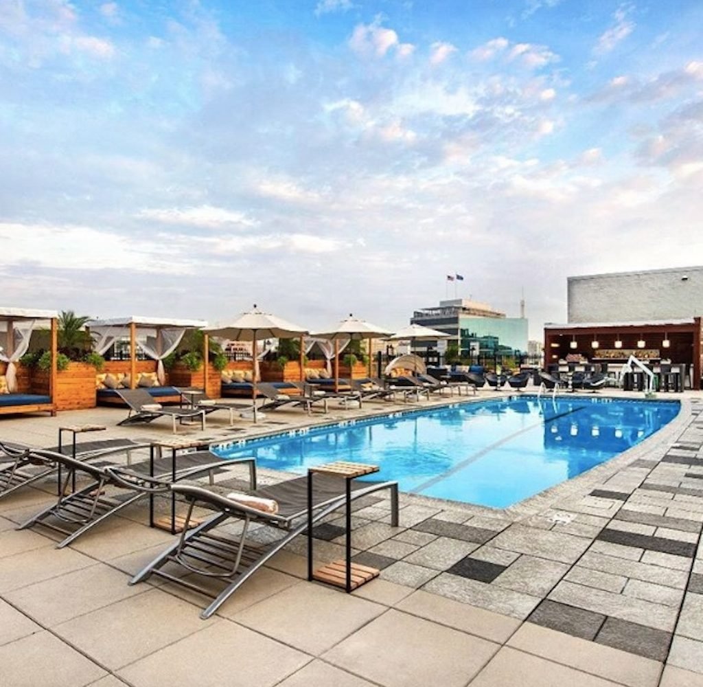 The Liaison hotel on Capitol Hill debuts its new rooftop pool bar for summer fun. Photograph via Facebook