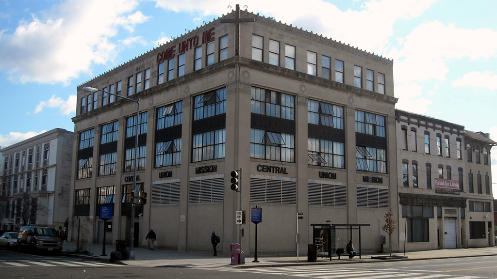 DC Housing Homelessness: The Central Union Mission's former facility (now part of The McReynolds Building project) located at 1631 14th Street, NW in Logan Circle. Photograph by AgnosticPreachersKid via Wikimedia Commons.