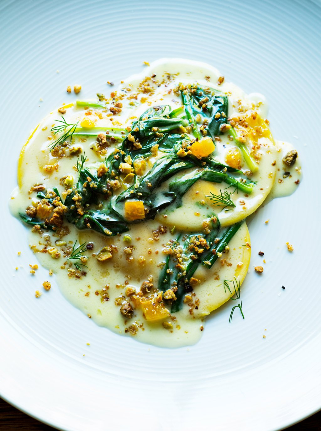 tail-up-goat-dish-carrot-ravioli-with-apricot - Washingtonian Tail Up Goat's carrot ravioli with apricot. Photograph by Scott Suchman.