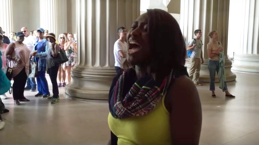 Florida woman belts out National Anthem at Lincoln Memorial. Screenshot via YouTube.