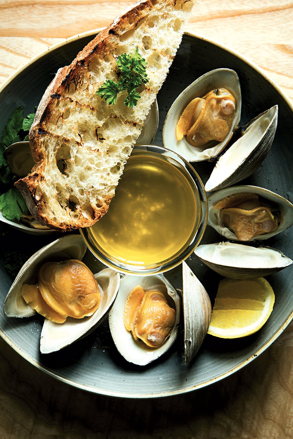 Steamed clams with butter at Ivy City. Photograph by Scott Suchman. (July 2016/Chesapeake Bay)