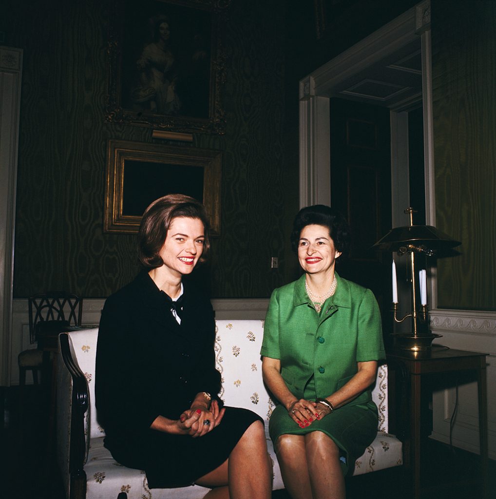 2016_July_nancy-dickerson - Washingtonian Nancy Dickerson, at left with Lady Bird Johnson, was a pioneering journalist. Her son–raised in McLean and educated at Sidwell–can't use the outsider schtick favored by some competitors. Photograph by Bettmann/Getty Images. (July 2016/Chesapeake Bay)