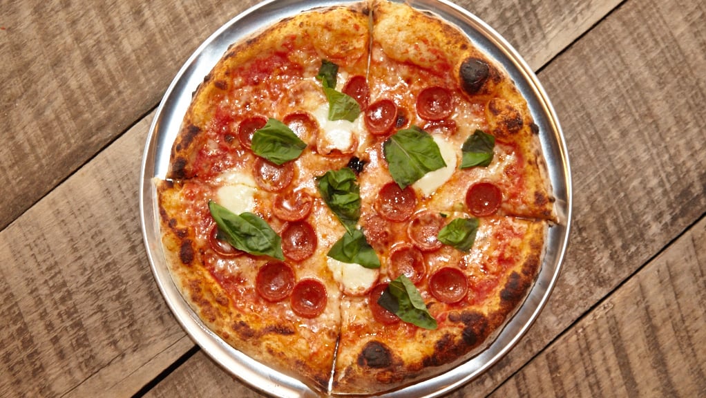 Make your own pizza at Timber Pizza Co. Photograph by Jeff Elkins. 