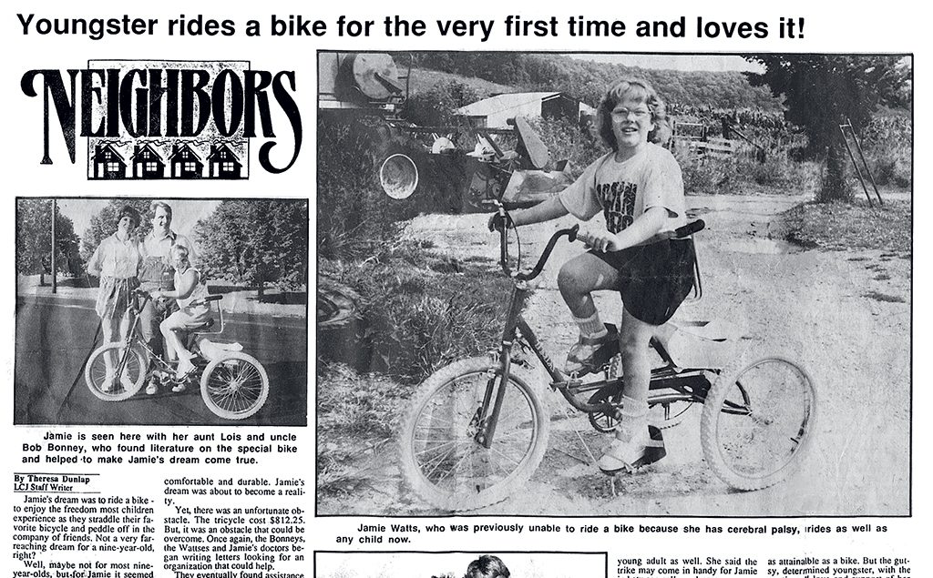 Watts was the only child in her school with a visible disability. When she got her first bike–a special tricycle made abroad–the local newspaper ran a full-page story. Photograph courtesy of Jamie Watts and Carolyn Gregory.