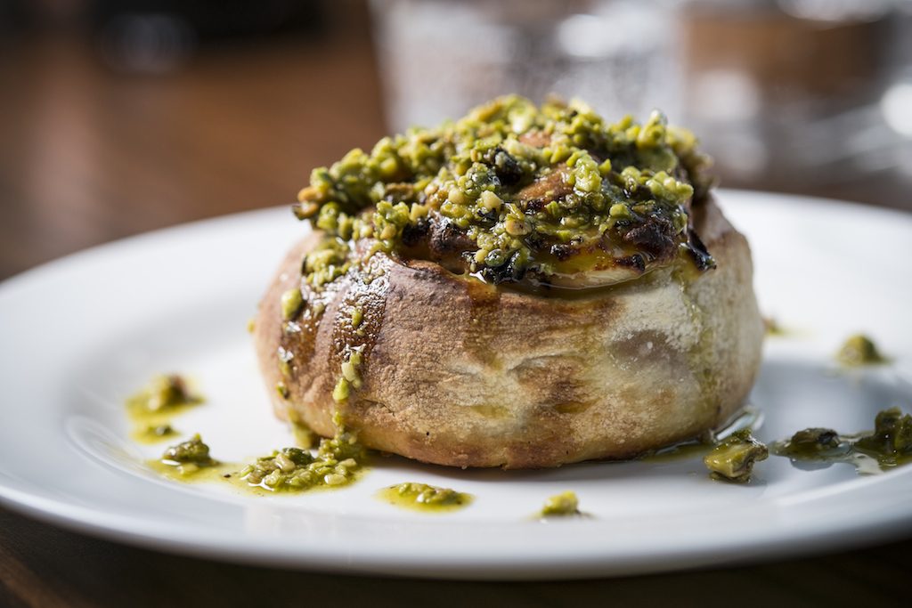 The "rotolo," stuffed with mortadella and ricotto, and topped with pistachio pesto. 