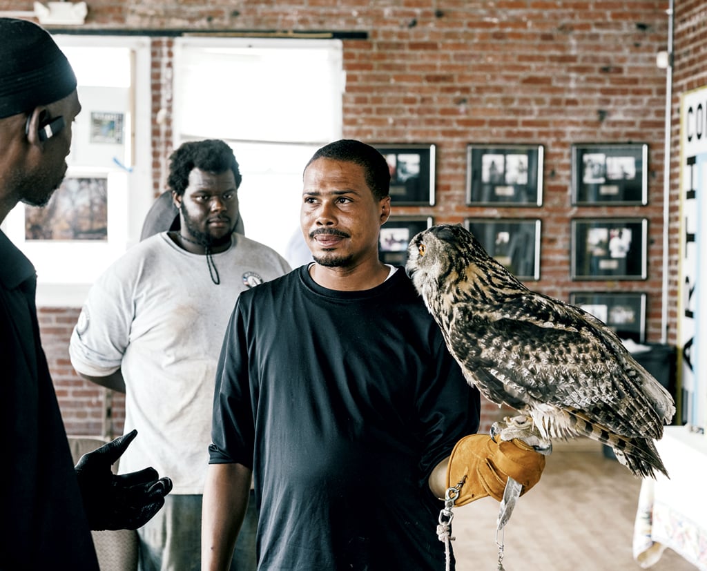 Twan Woods (center) started working with ECC as a teenager, when the river was at its worst. He's 40 now. Photograph by Greg Kahn.