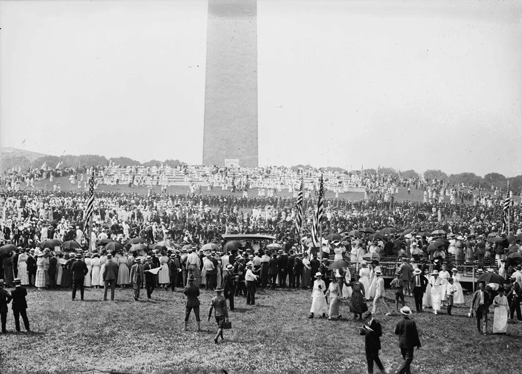 Crowds gathered around the Washington Monument for a Fourth of July celebration. Photograph via National Photo Company Collection (Library of Congress).