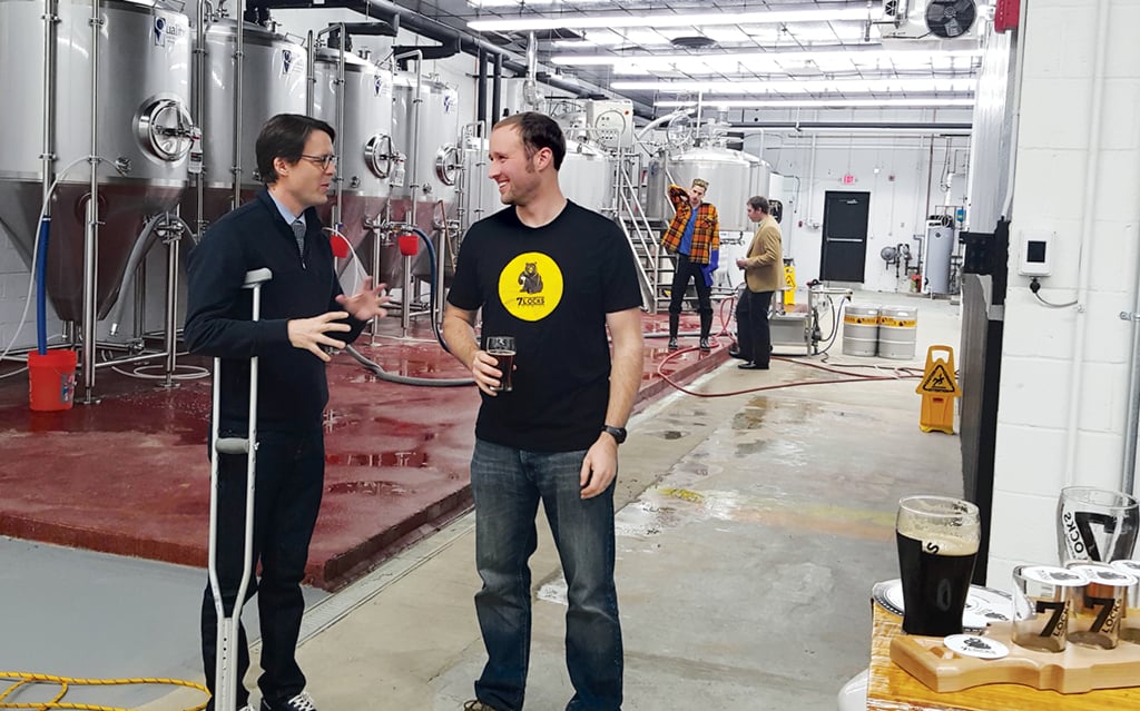 montgomery-county-liquor-bureaucracy_hans-riemer-jim-beeman-rockville-7-locks-brewing - Washingtonian Council member Hans Riemer with Jim Beeman, cofounder of Rockville's 7 Locks Brewing, exempt from the county monopoly because it serves beer made on-site. Photograph courtesy of Hans Riemer.