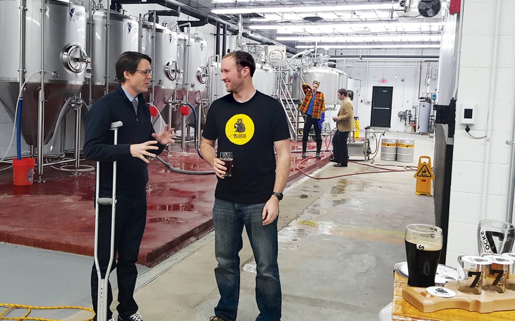 Council member Hans Riemer with Jim Beeman, cofounder of Rockville's 7 Locks Brewing, exempt from the county monopoly because it serves beer made on-site. Photograph courtesy of Hans Riemer.