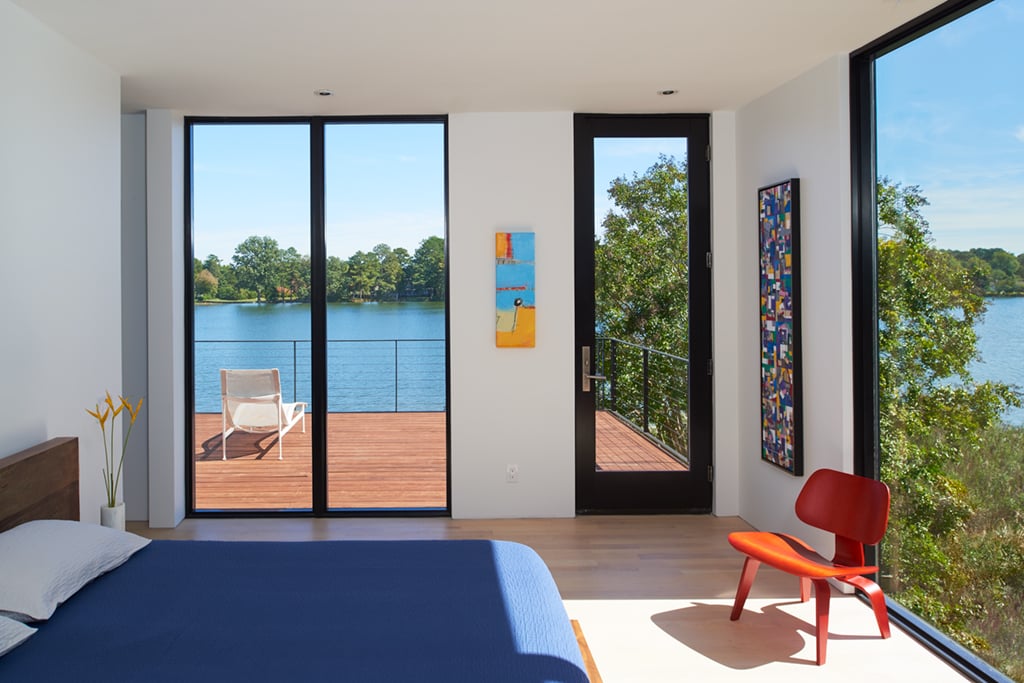 waterfront-eastern-shore-home-bedroom - Washingtonian DC Home Redesign: Most of the owners' art collection, including the pieces in the bedroom, is by Washington artists. Photograph by Anice Hoachlander/Hoachlander Davis Photography.