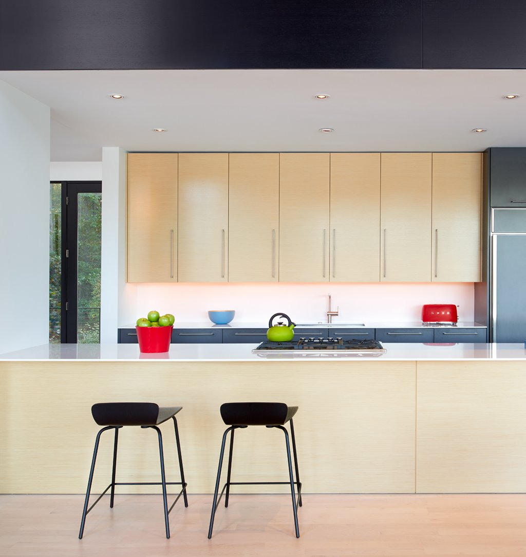 waterfront-eastern-shore-home-kitchen - Washingtonian DC Home Redesign: Gurney almost always paints his interiors white. Bright accessories add color. Photograph by Anice Hoachlander/Hoachlander Davis Photography.