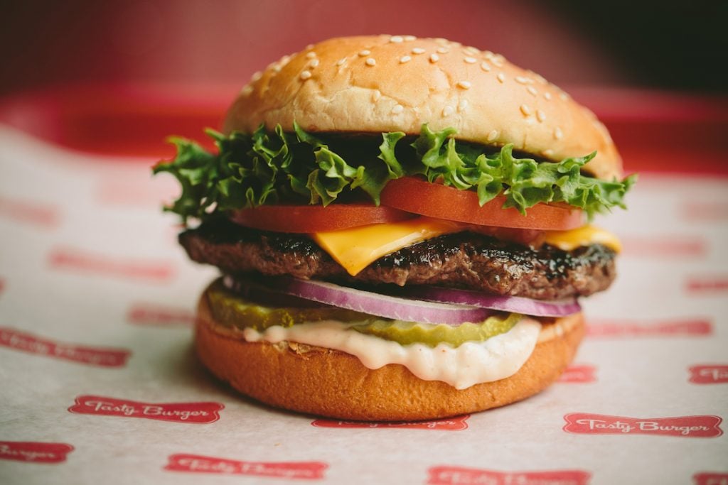 The "Big Tasty" lands in Shaw, alongside crispy chicken sandwiches and foosball at Tasty Burger's new location. Photograph courtesy of Tasty Burger 