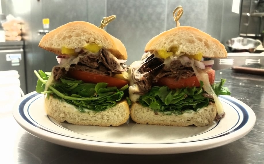 Duke's Counter serves up towering sandwiches, like the Taken with Liberty (ribeye, garlic aioli, peppers) across from the National Zoo. Photograph courtesy of Duke's
