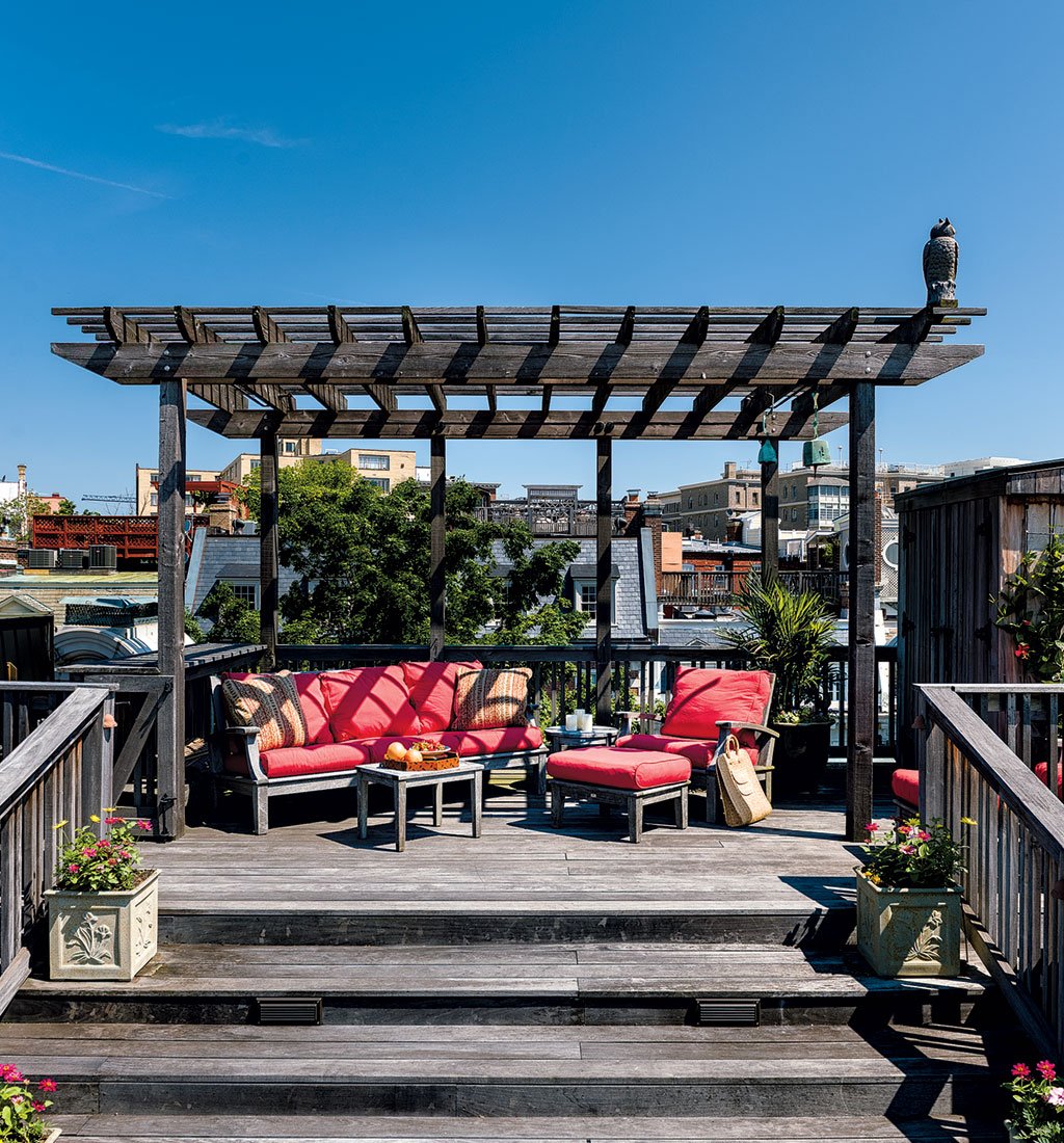kalorama-roof-deck-inspiration-terrace - Washingtonian A seating area underneath a pergola offers shade for family guests.