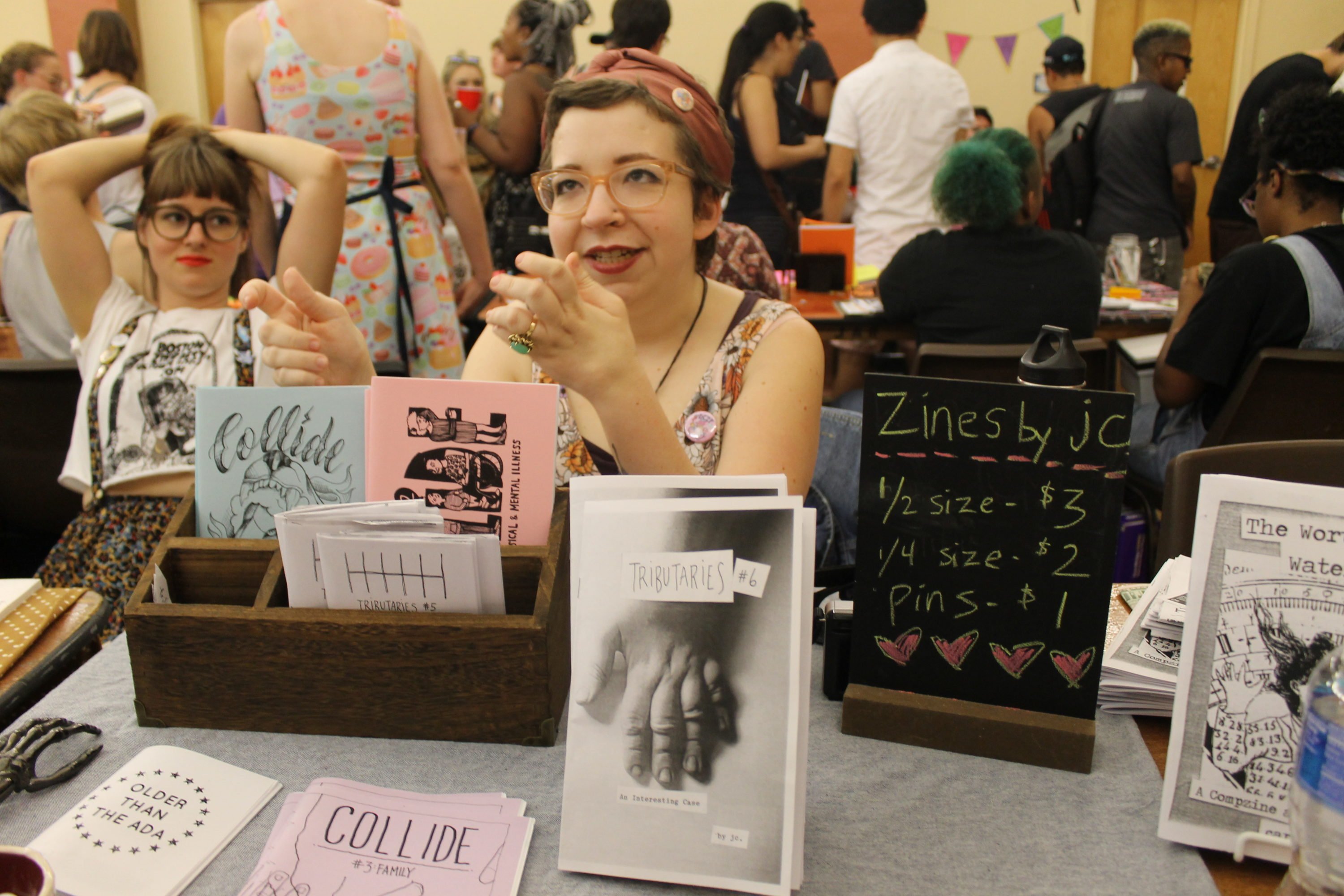 JC Parker talking about her zine "Tributaries" at Zinefest. Photo by Greta Weber.