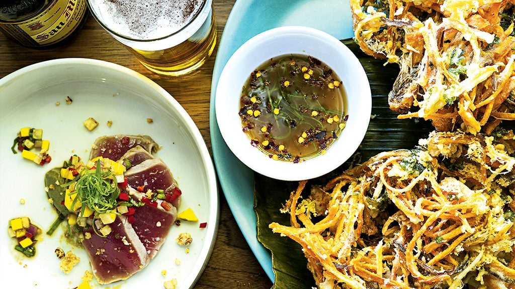 Kinilaw (tuna, avocado, chilis) and Ukoy (freshwater shrimp fritters, sweet potato, leeks) at Bad Saint. Photograph by Scott Suchman.