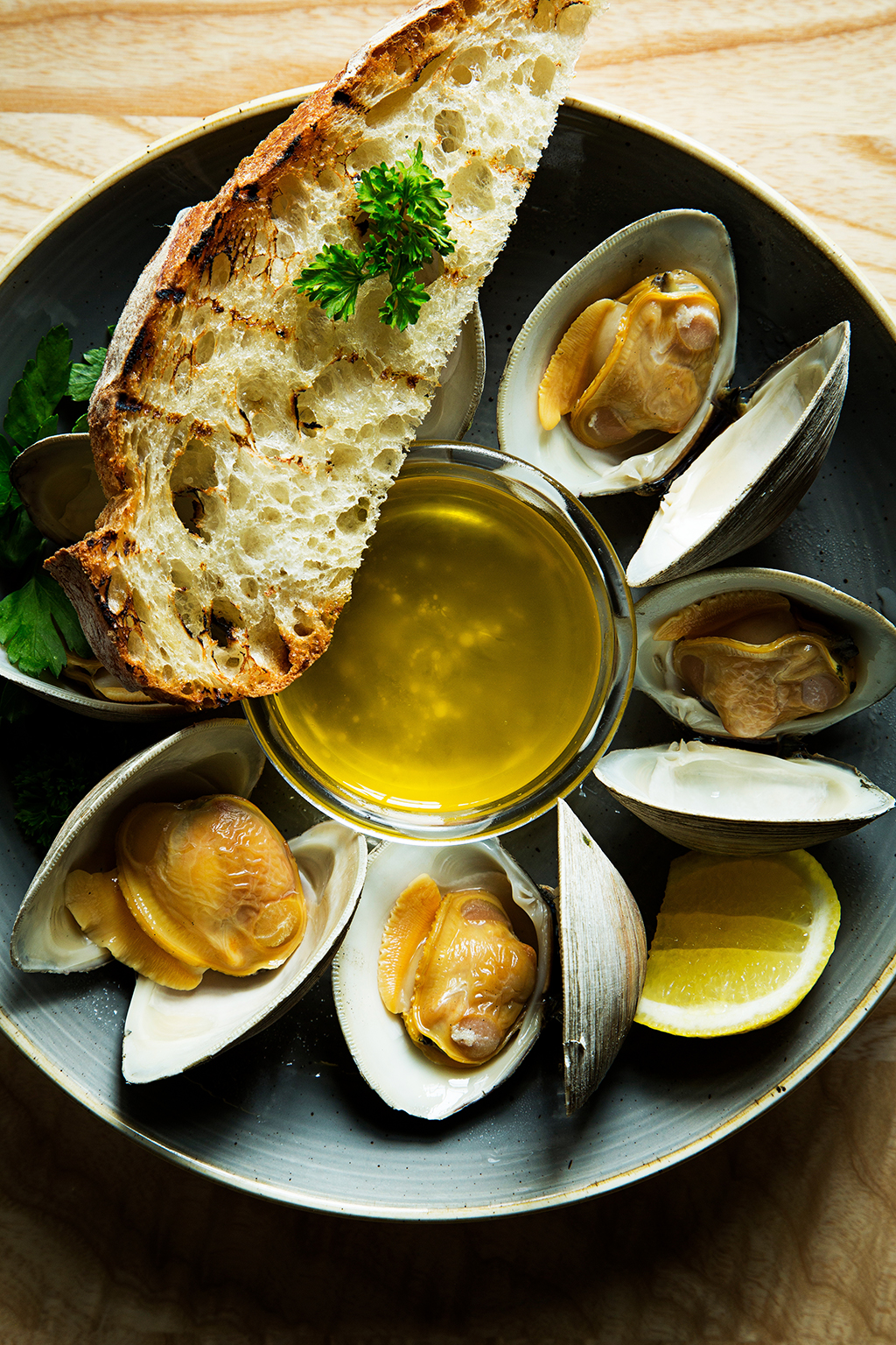 Steamed clams with butter. Photograph by Scott Suchman.