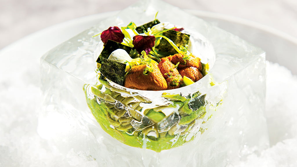 An ice cube holds tea-laced soba noodles with sea urchin at Pineapple and Pearls. All photographs by Scott Suchman.