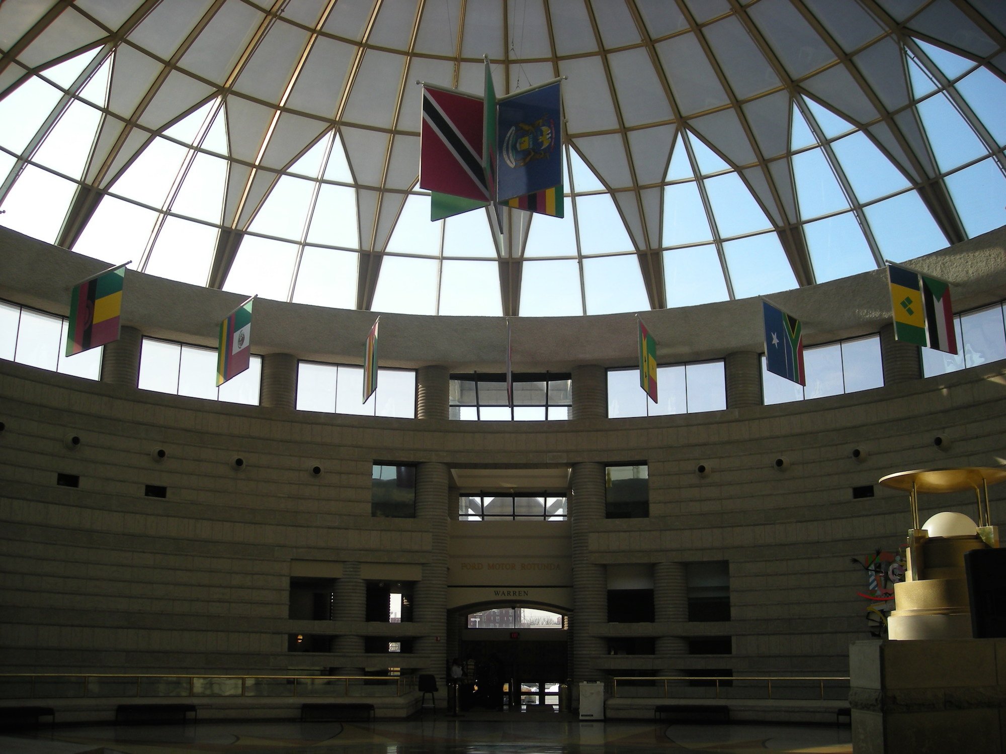 Ford Freedom Rotunda displaying 92 flags representing countries historically involved in the Atlantic slave trade. Photograph by Michael Barera \via wikimedia commons