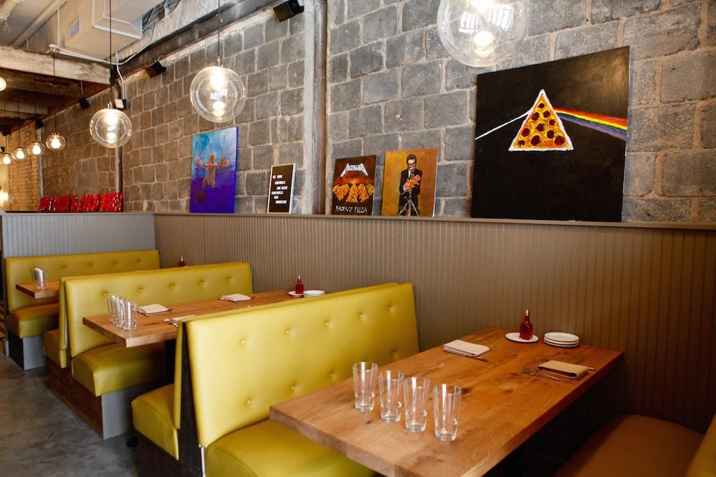 Co-owner Jackie Greenbaum created the wall art, which combines pizza and pop culture.