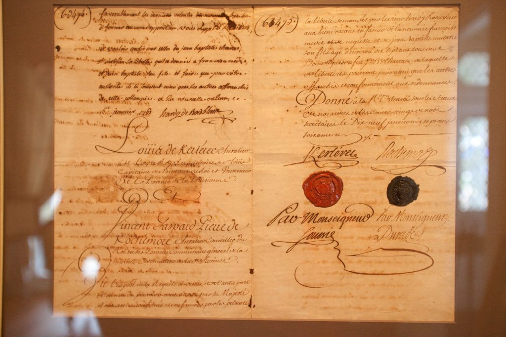 Original Manumission Paper for Francoise Amedee and her 10-year old son signed by Governor Louis Kerlerec in 1751. Photograph courtesy of Le Musée de f.p.c.