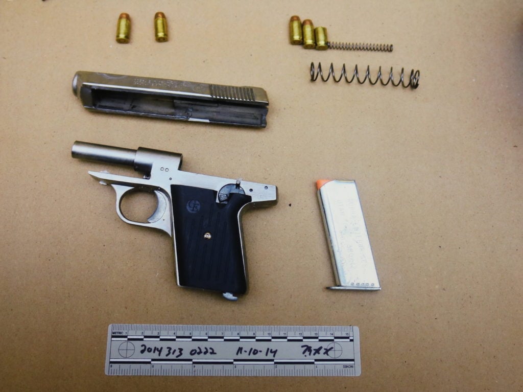 photograph-of-gun-parts-and-ammunition-found-in-bag-copy