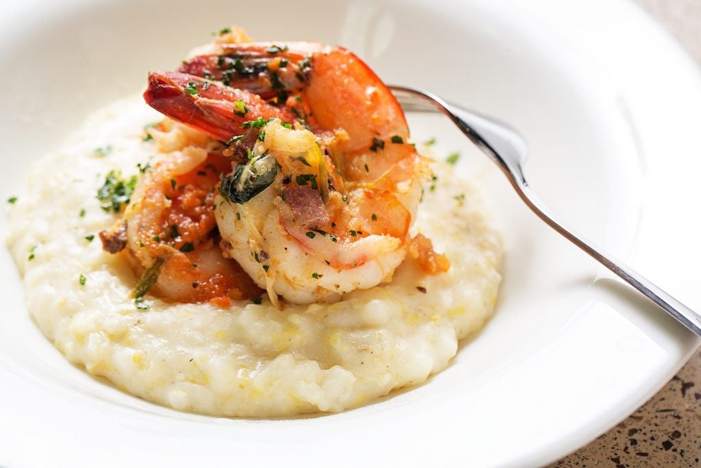 Familiar favorites like shrimp and grits and pulled pork sandwiches are offered alongside less-known specialties. 