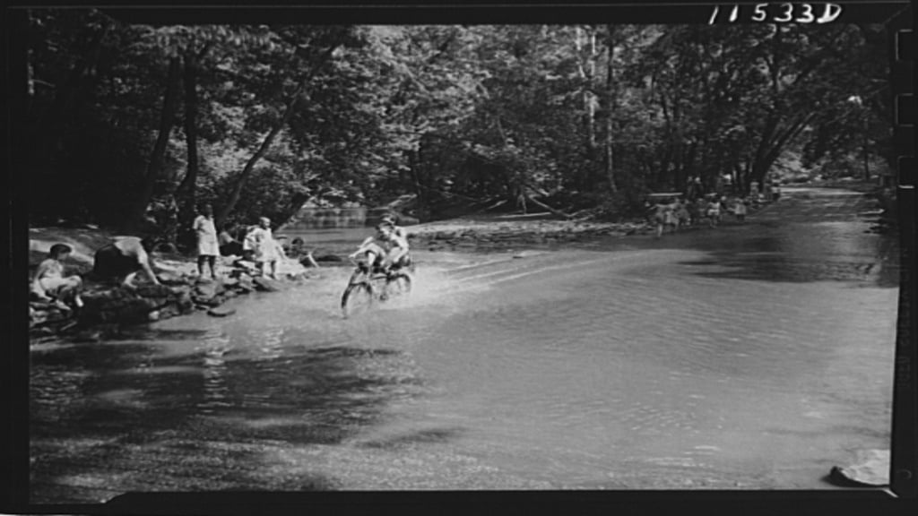 Boys ride bikes at Rock Creek Park, May 1942. Photograph by John Ferrell