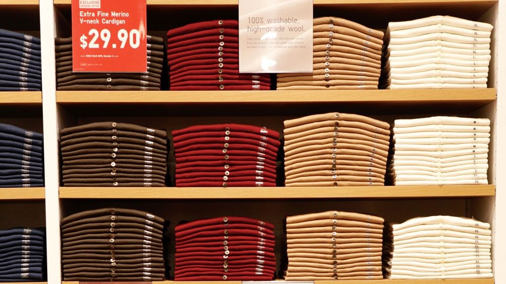 10-28-16-uniqlo-sweater-folding-lede - Washingtonian Sweater wall at Uniqlo. Photograph by Evy Mages.