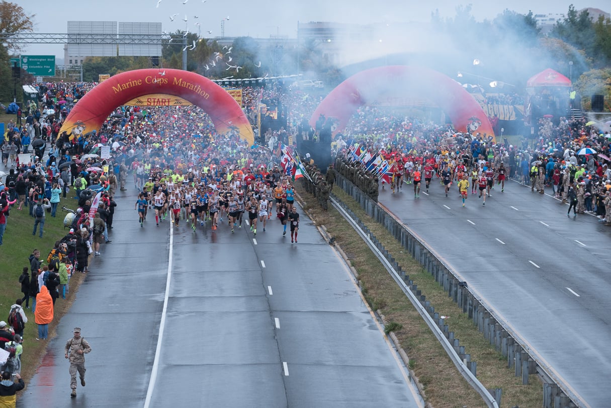 he start of the Marine Corps Marathon, near the Pentagon on Route 110, is a mash-up of adrenaline, anticipation, and nerves. Waves of runners—about 30,000 registered for the race in 2015—move closer and closer to the starting line, as a final step before their months of training are put to the test. 