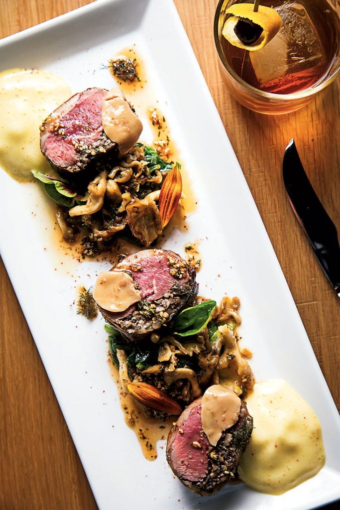 Mushroom-stuffed lamb with foie-gras béarnaise at Live Oak. Photo by Scott Suchman.