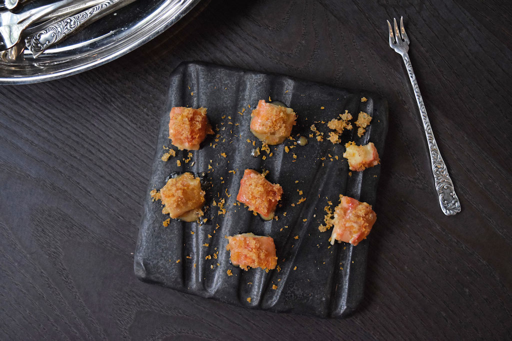 Other small bites include king crab roasted in garlic butter with uni bottarga.