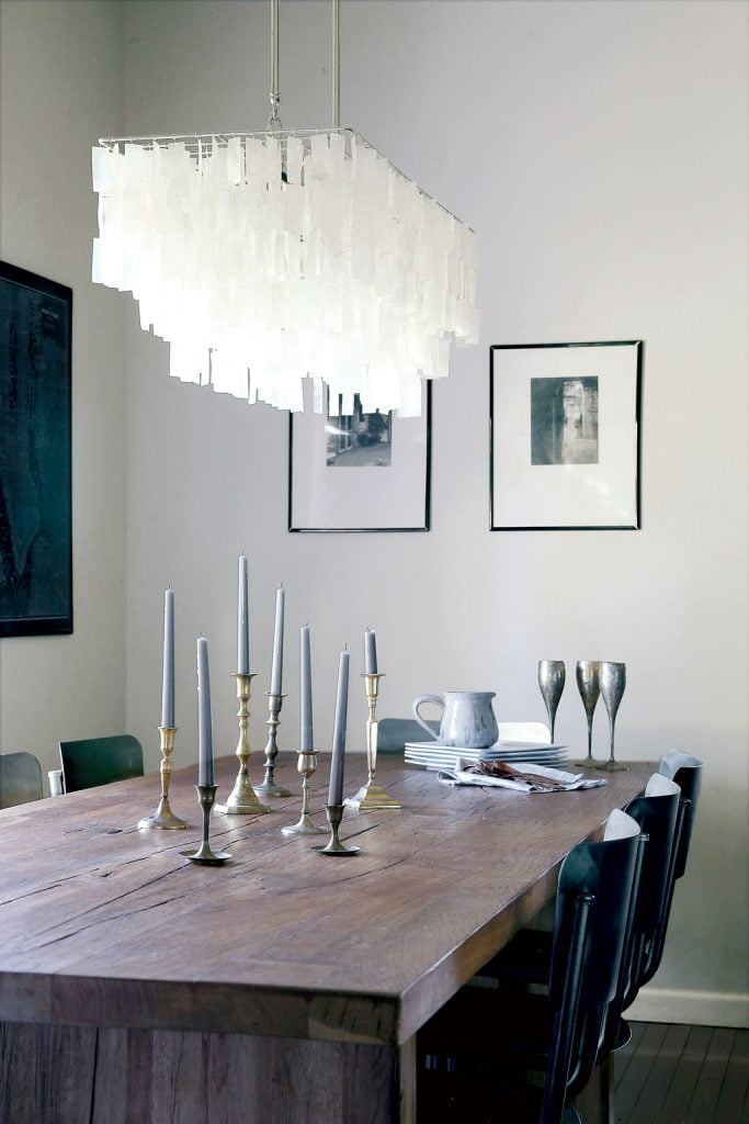 kitchens14 - Washingtonian A wooden table adds rusticity. The Capiz-shell chandelier is from West Elm, the metal chairs from Restoration Hardware. Photo by Christopher Shane.