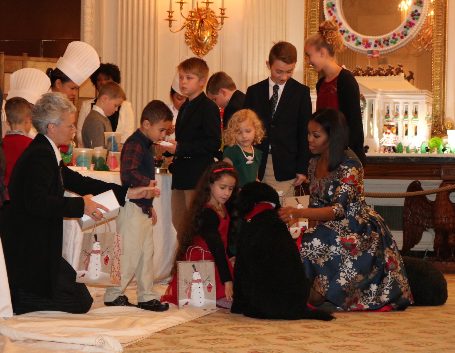 First Lady Michelle Obama meets with kids at the 2016 White House Christmas. Photo by Sydney MaHan.