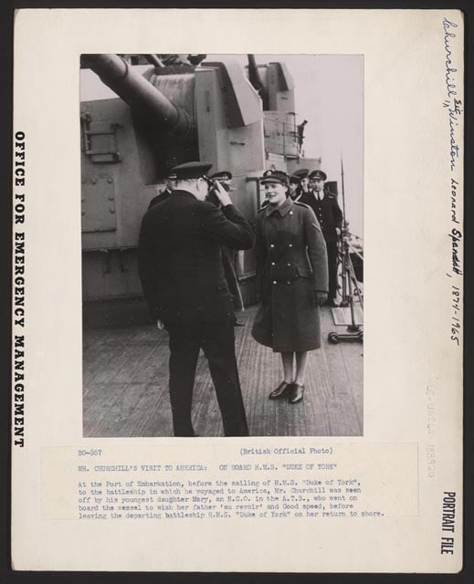 British Prime Minister Winston Churchill saluting his daughter as he leaves on the HMS Duke of York to come to American in December 1941. Photo via Library of Congress.