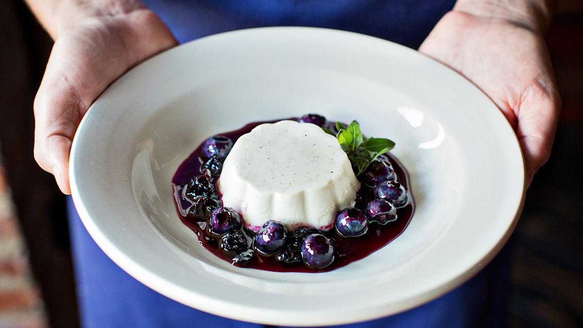Buttermilk panna cotta with blueberries at The Red Hen. Photograph by Scott Suchman.