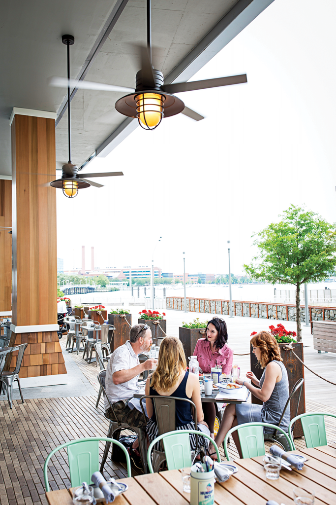 A patio overlooks the Anacostia River.