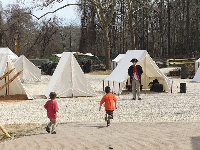 Army encampment. Photograph Courtesy of Virginia’s American Revolution Museum at Yorktown.