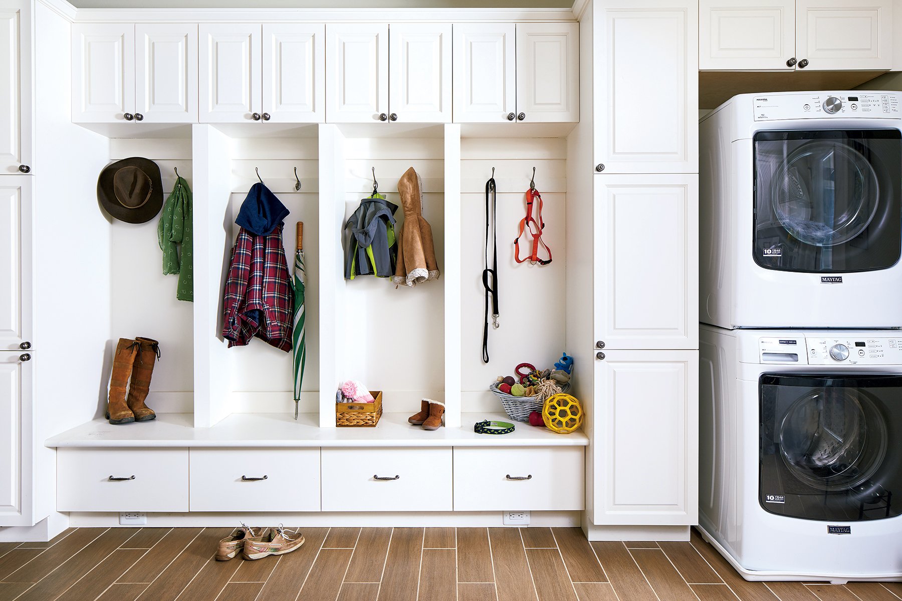 The opposite wall of Sappington's mudroom features ample built-in storage plus a washer and dryer specifically for pet blankets and towels. Photograph by Stacy Zarin Goldberg.