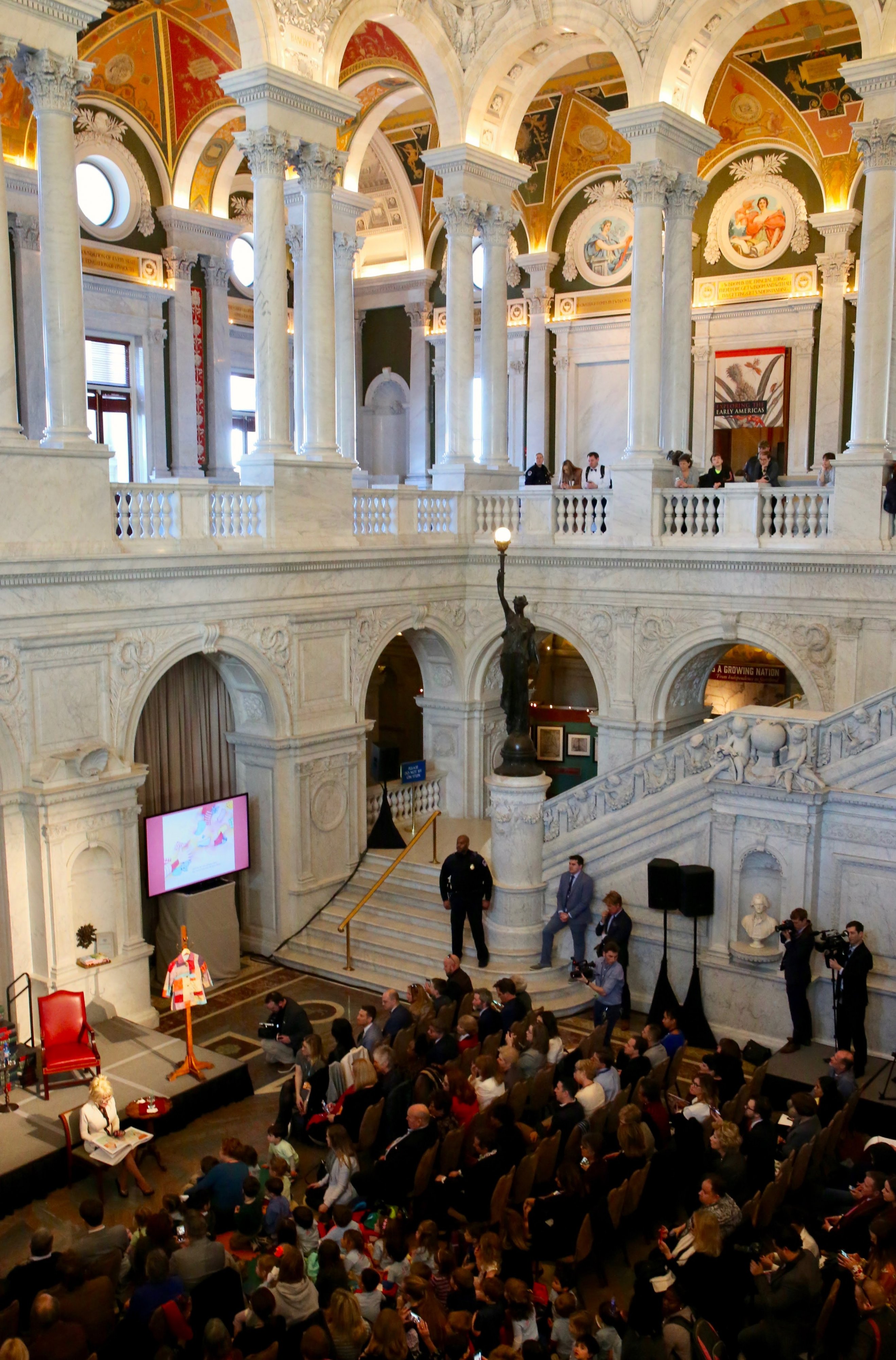 Parton read her book and sang "Coat of Many Colors" to the school children assembled on the floor. Each child took home a free copy of "Coat of Many Colors."