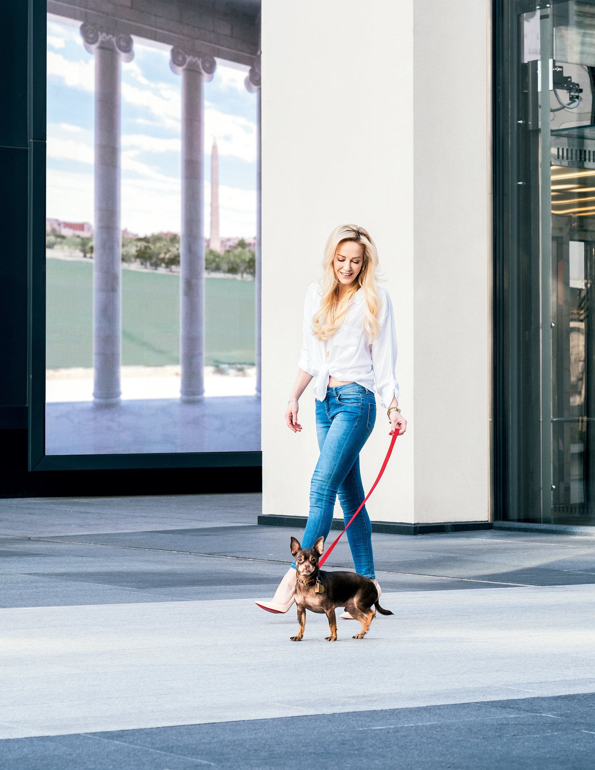 Linton walks her dog at CityCenterDC. Photograph by Marisa Guzman-Aloia.