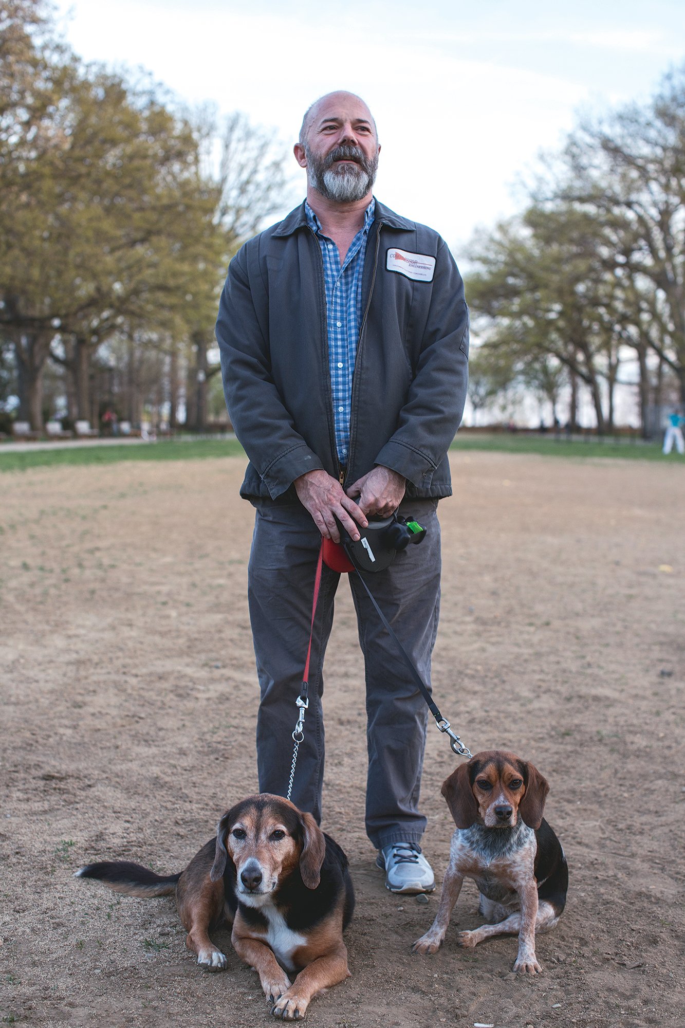 Sullivan with his dogs in Meridian Hill Park. Photograph by Joshua Cogan.