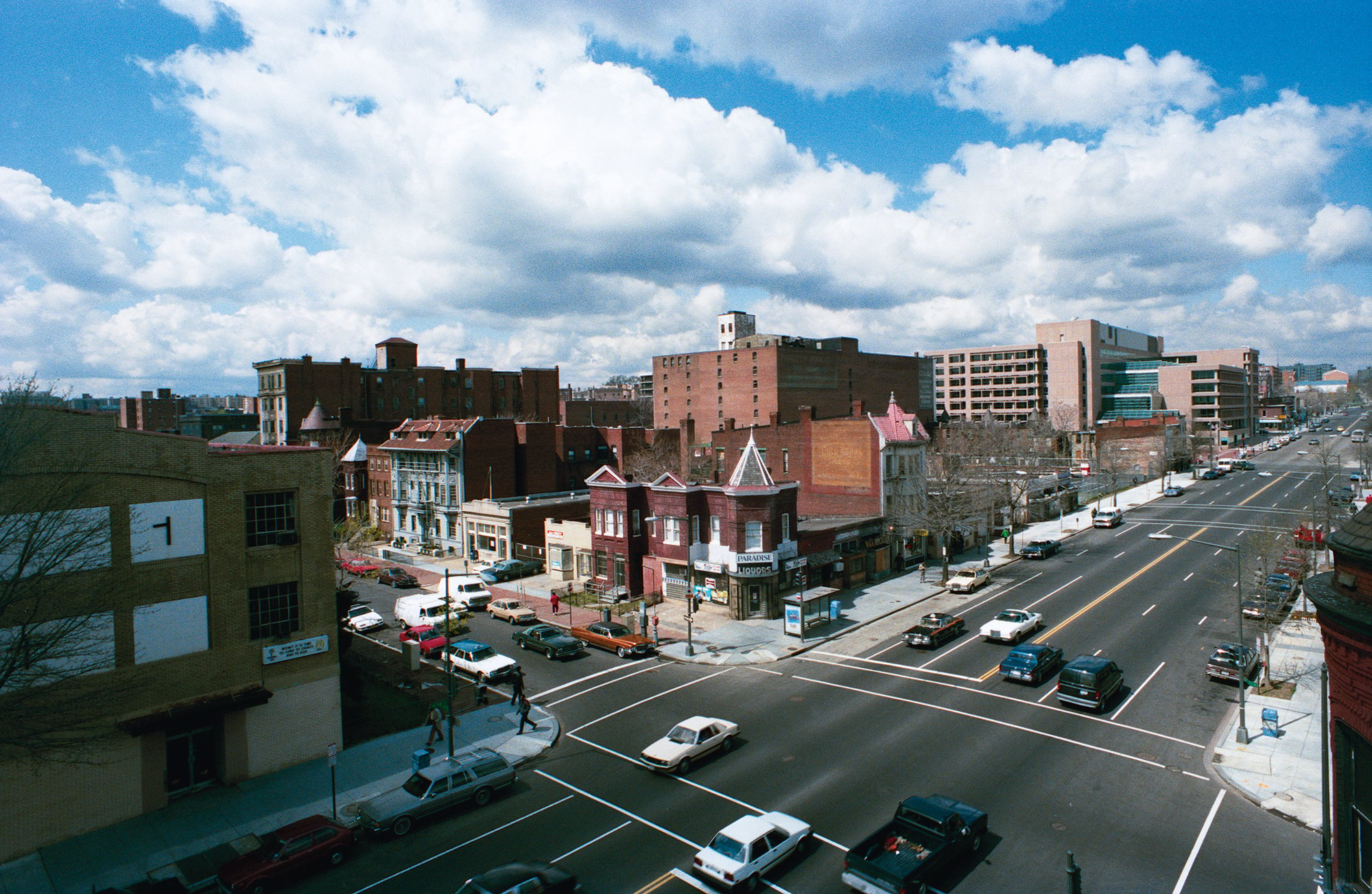 In the 1980s, while most of the street was still empty, open-air drug markets flourished at 14th and T (above) as well as one block south. Photograph by Michael J. Horsley.