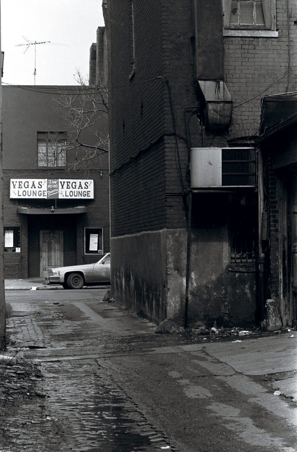 The nightlife that did manage to survive found clientele in unlikely places. Drug kingpin Rayful Edmond used to hang out at the New Vegas Lounge, at 14th and P, across from where a Whole Foods stands today. Edmond’s crew didn’t drink—and the staff said they never made trouble inside. Photograph by Michael J. Horsley.