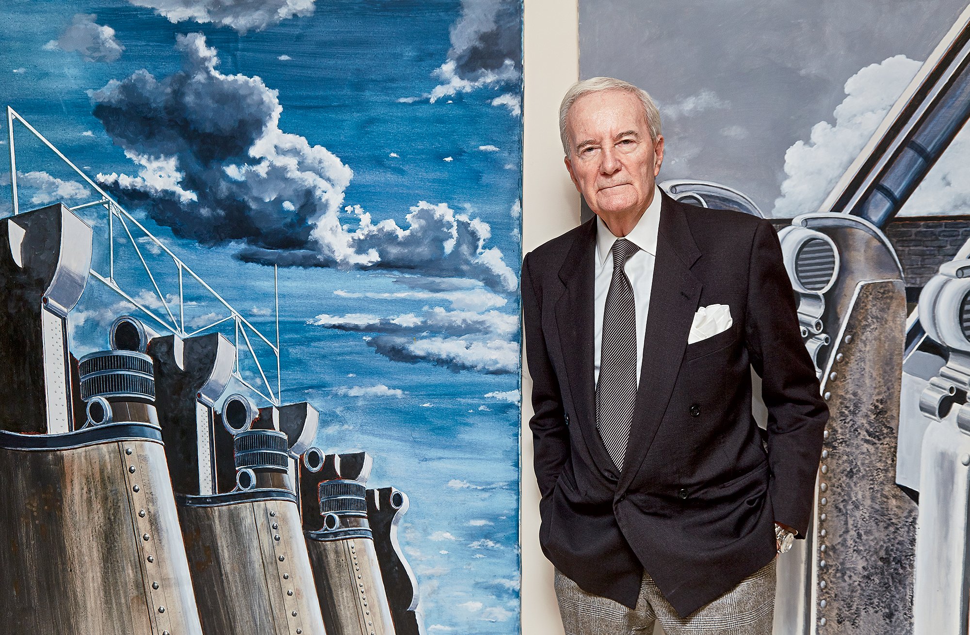ACMFeat - Washingtonian Architect Arthur Cotton Moore in front of his own paintings at his home in the Watergate. Photograph by Jeff Elkins.