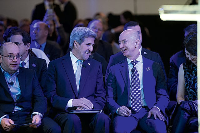 At the opening of the Post’s new building with John Kerry and Post journalist Jason Rezaian, who had been in prison in Iran. Photograph by Dan Swartz.