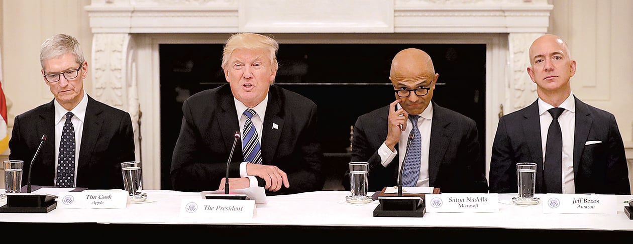 BezosTrump - Washingtonian At the White House for a meeting of tech leaders in June 2017, by which point Trump was fond of attacking Bezos’s “Amazon Washington Post” on Twitter. Photograph by Chip Somodevilla/Getty Images.