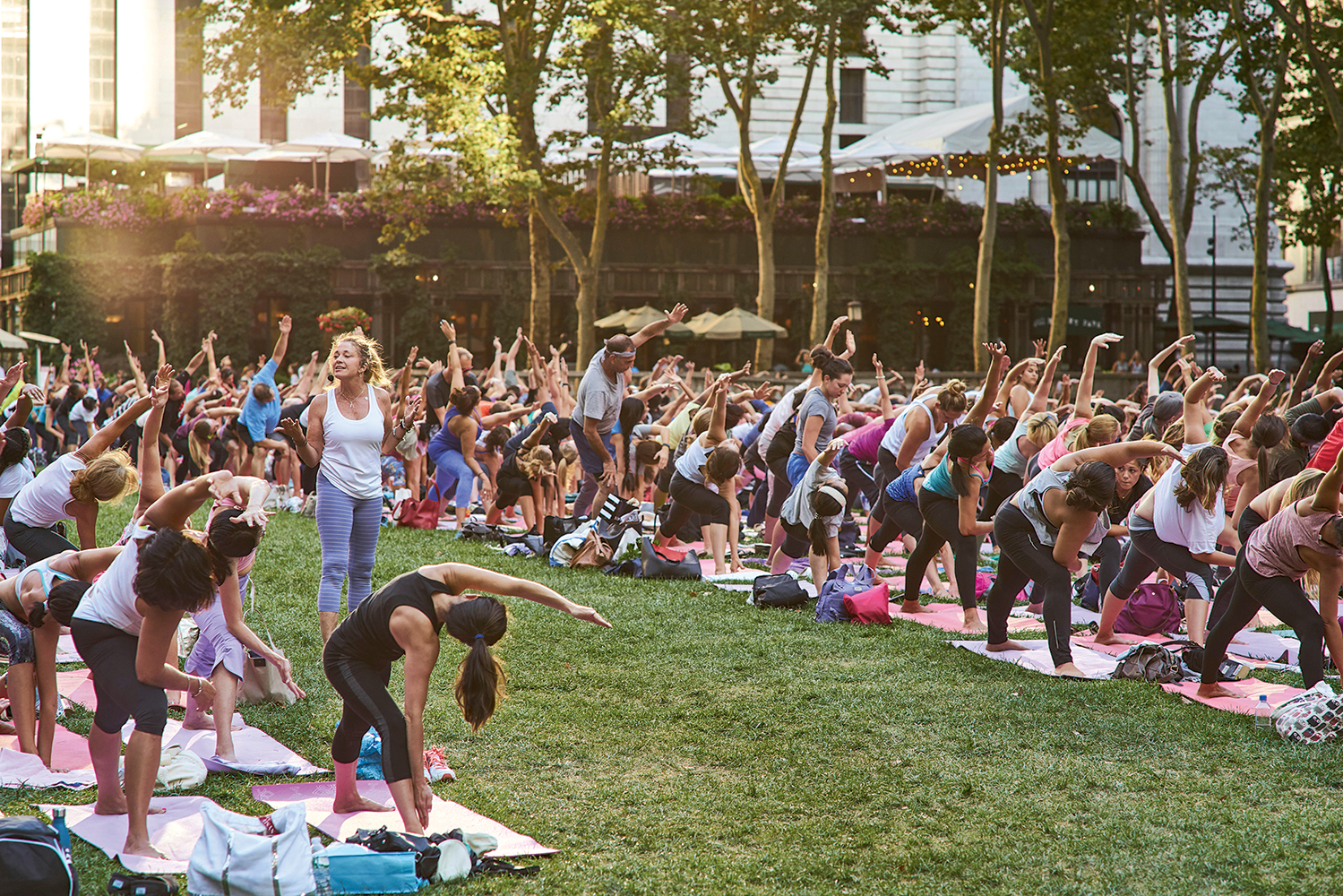 NYC6 - Washingtonian Pretend you’re a local: Take advantage of free yoga in Bryant Park and no-admission-fee Fridays at the Museum of Modern Art. Photograph of Bryant Park by Francisco Dominguez/Alamy.
